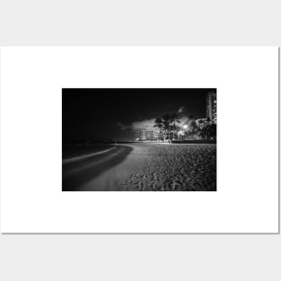 Beach palm trees and  buildings of Waikiki from beach on tropical island  night Posters and Art